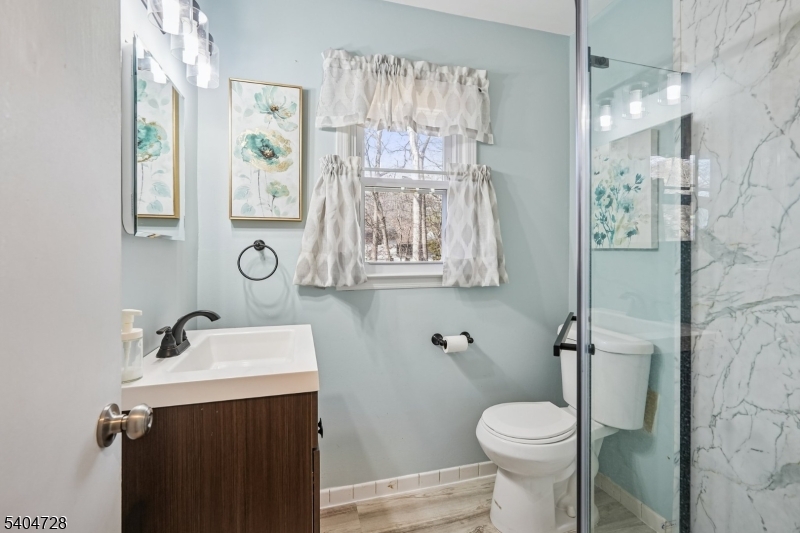 15 Southview Road Randolph, NJ 07869 - Photo 24 of 39 a bathroom with a sink toilet and shower