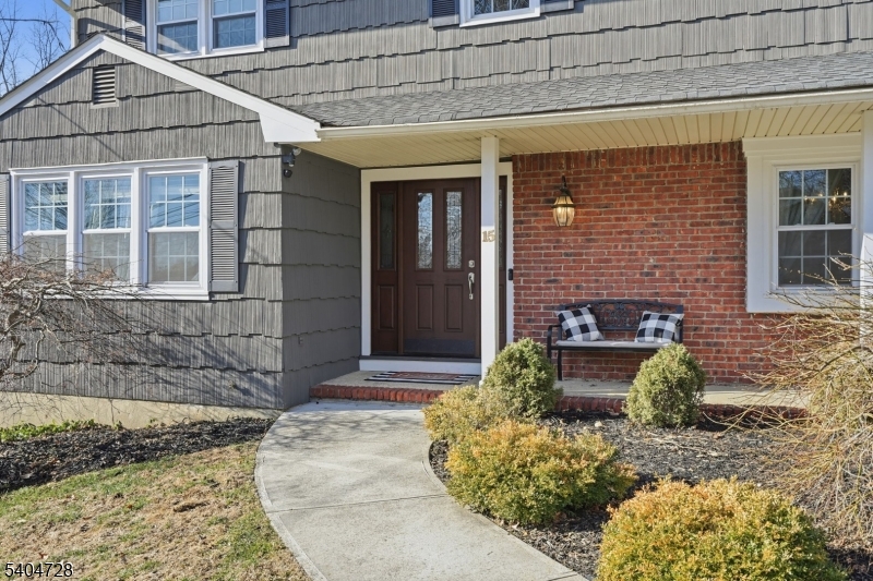 15 Southview Road Randolph, NJ 07869 - Photo 4 of 39 a front view of a house with garden