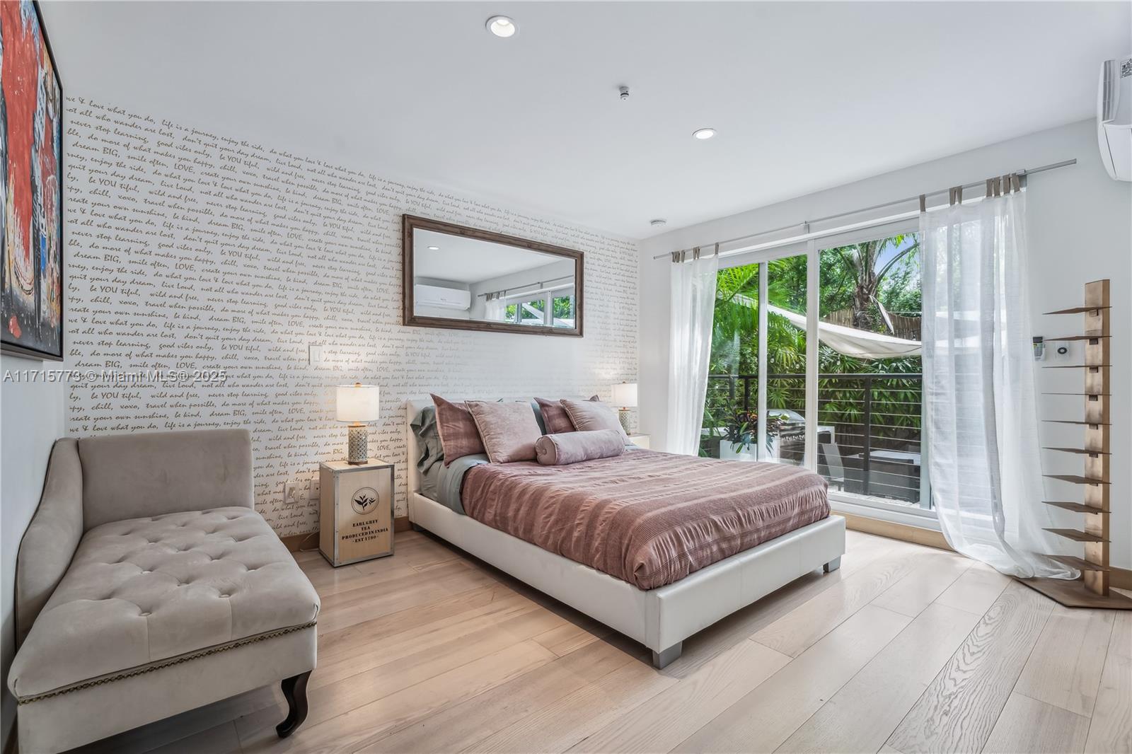 4365 North Bay Road Miami Beach, FL 33140 - Photo 11 of 35 a bedroom with a bed and a large window