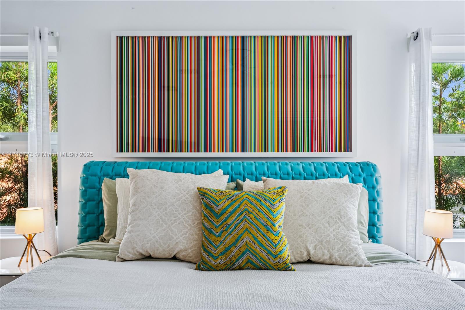 4365 North Bay Road Miami Beach, FL 33140 - Photo 15 of 35 a white couch sitting in front of a window