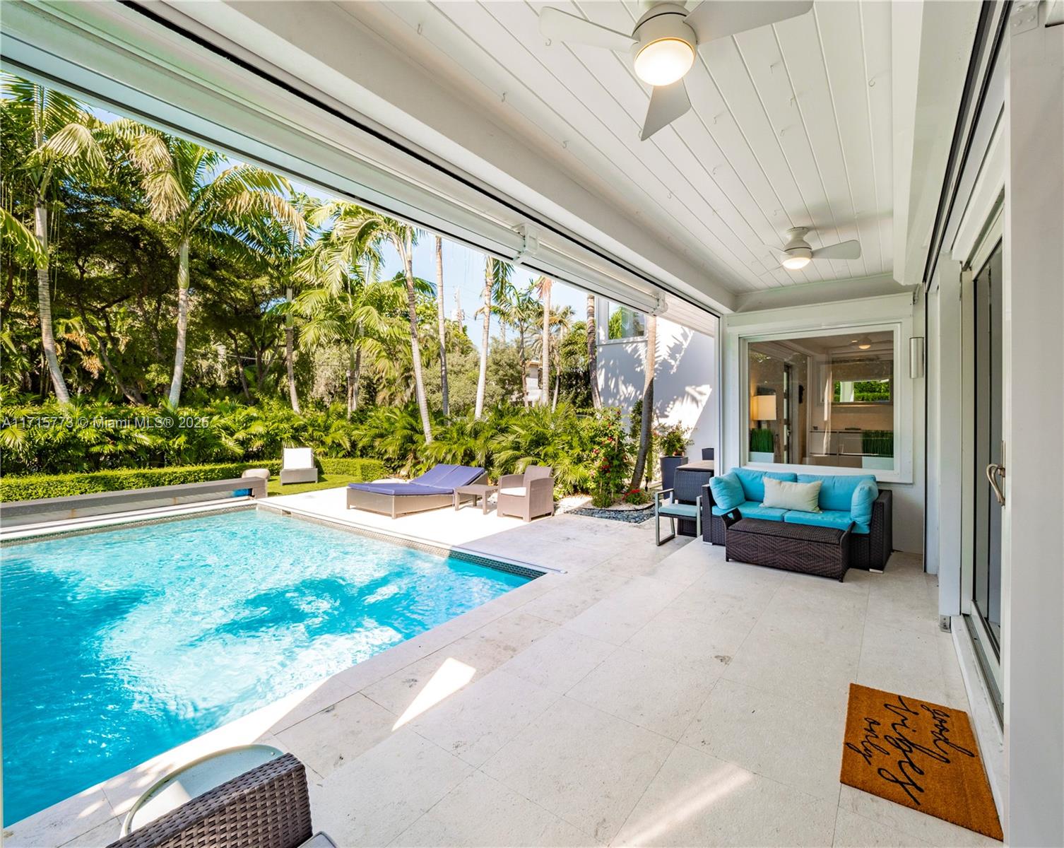 4365 North Bay Road Miami Beach, FL 33140 - Photo 32 of 35 a lobby with furniture and garden view