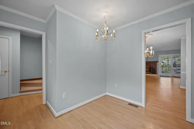 a kitchen with stainless steel appliances a refrigerator sink and cabinets