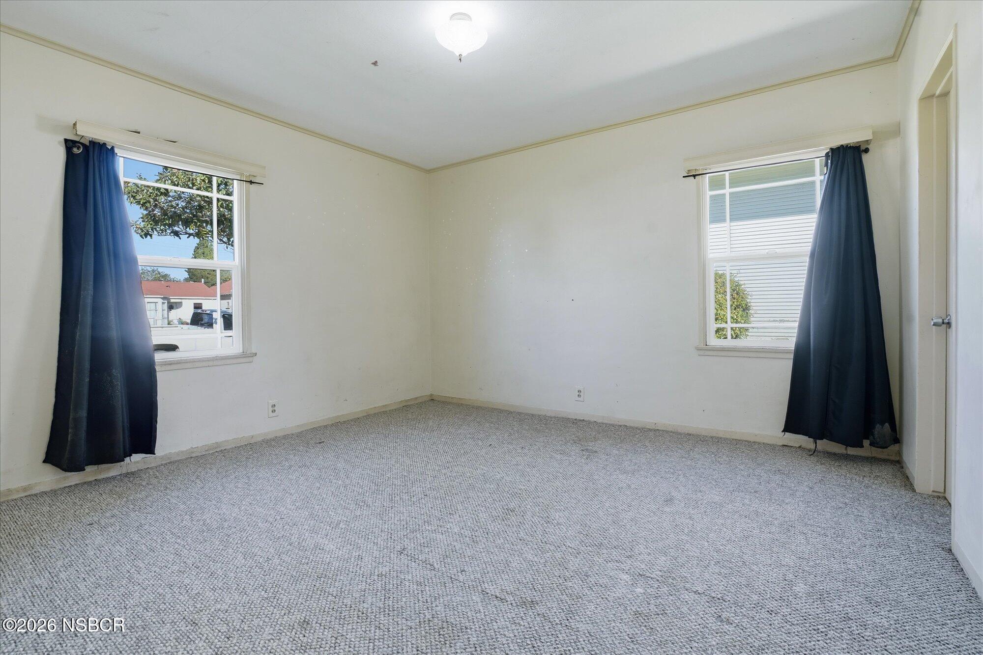 308 West Mill Street Santa Maria, CA 93458 - Photo 14 of 24 an empty room with windows