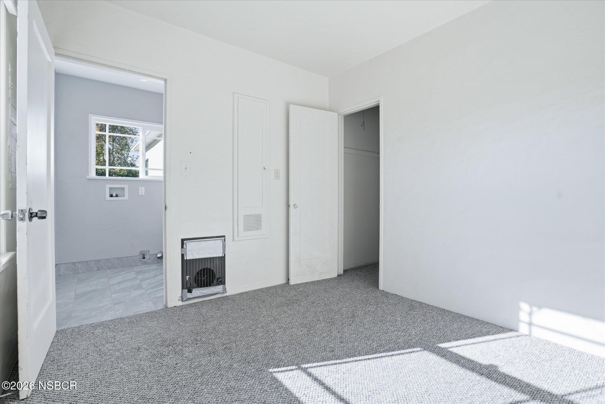 308 West Mill Street Santa Maria, CA 93458 - Photo 17 of 24 an empty room with windows