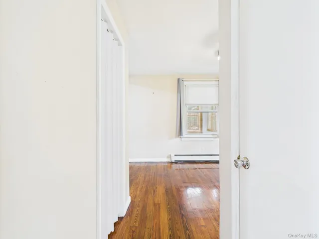 a view of a living room with a window