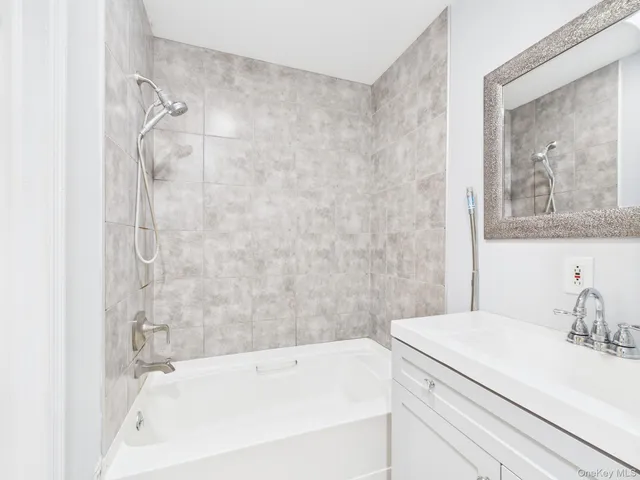 a bathroom with a sink and a bathtub