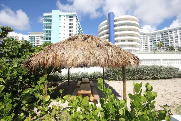 a backyard of a building with lots of green space