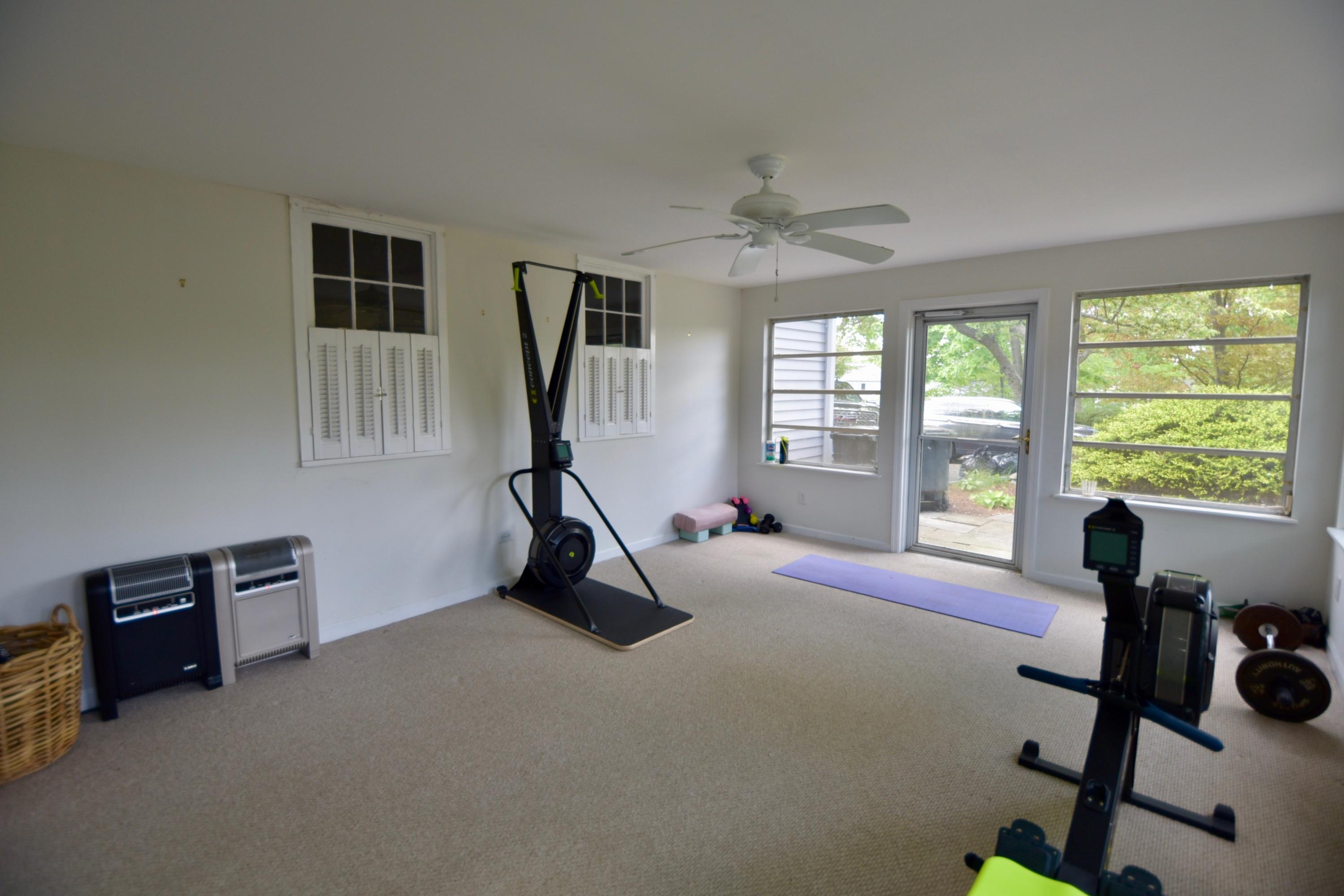 4 Hedge Row Darien, CT 06820 - Photo 12 of 15 a room with gym equipment and a large window