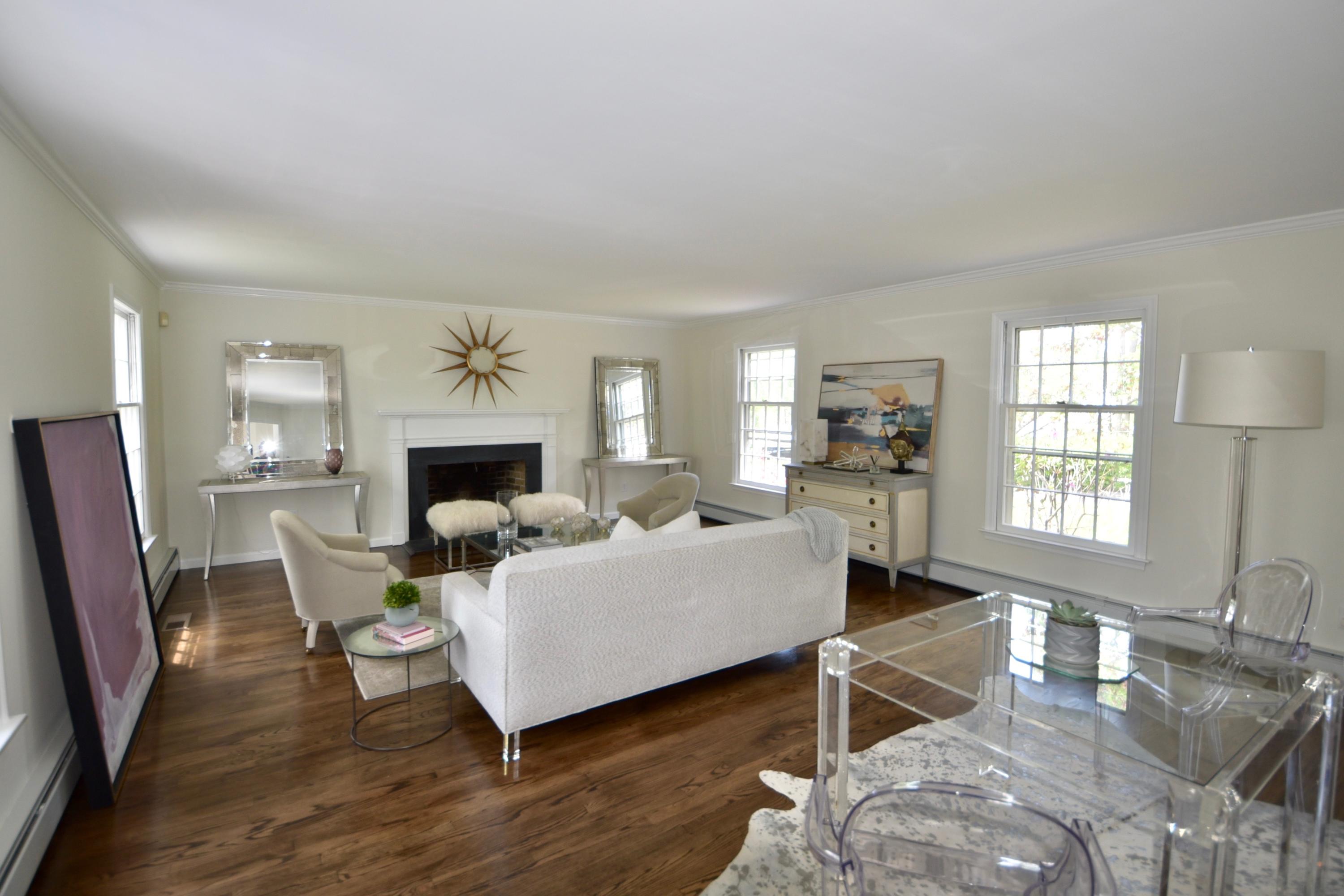 4 Hedge Row Darien, CT 06820 - Photo 7 of 15 a living room with furniture fireplace and window