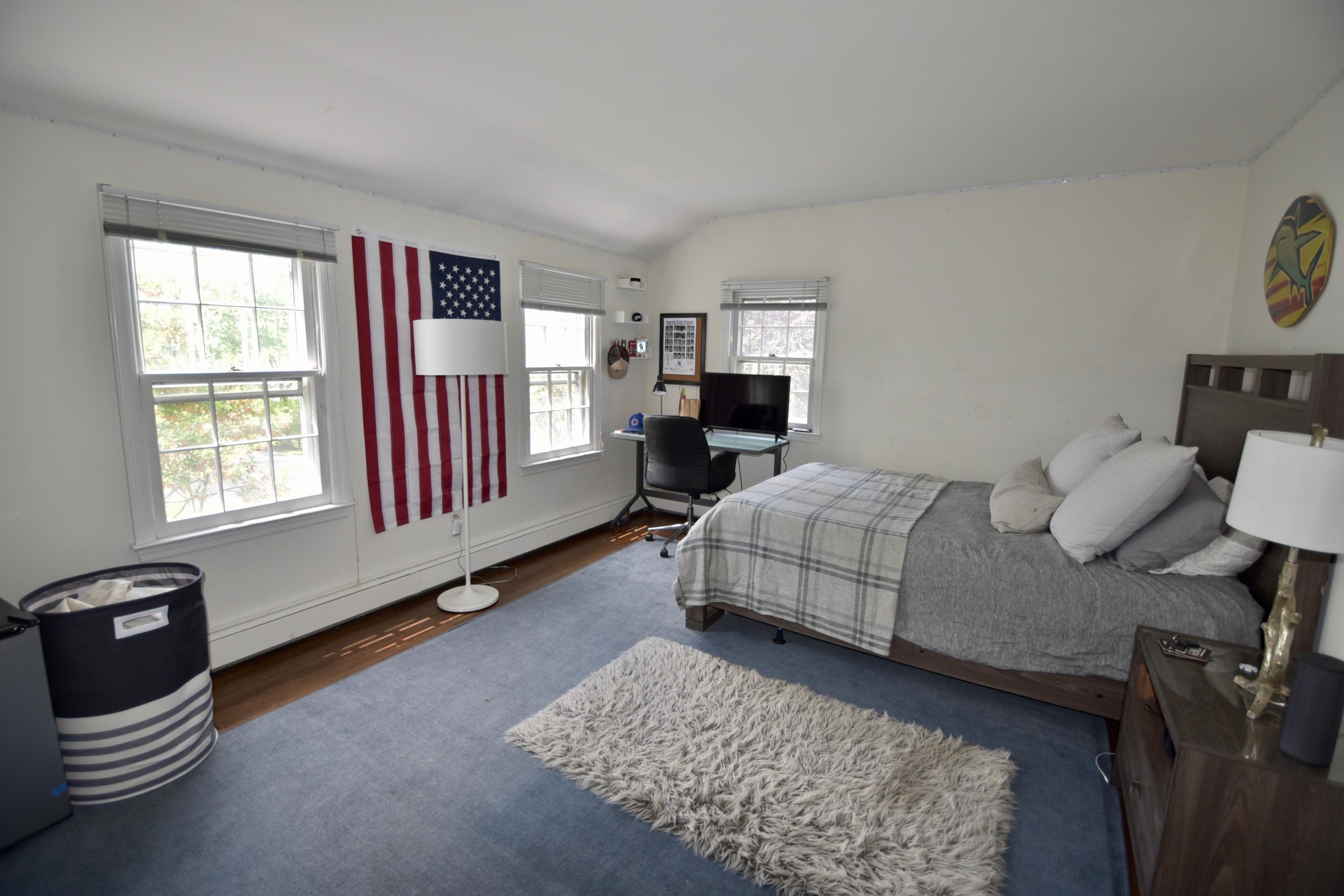 4 Hedge Row Darien, CT 06820 - Photo 10 of 15 a bedroom with furniture and a window