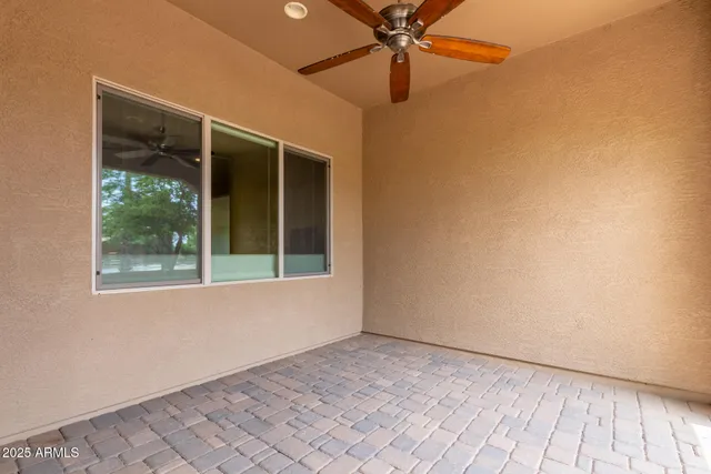 a view of a balcony with wooden floor