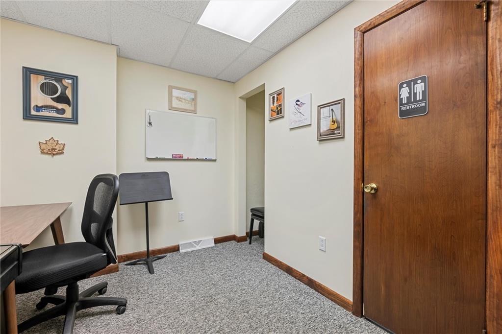 129 North Washington Street Butler, PA 16001 - Photo 12 of 42 a view of a workspace with furniture and a window
