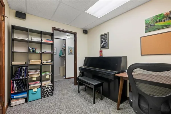 a view of a workspace with furniture