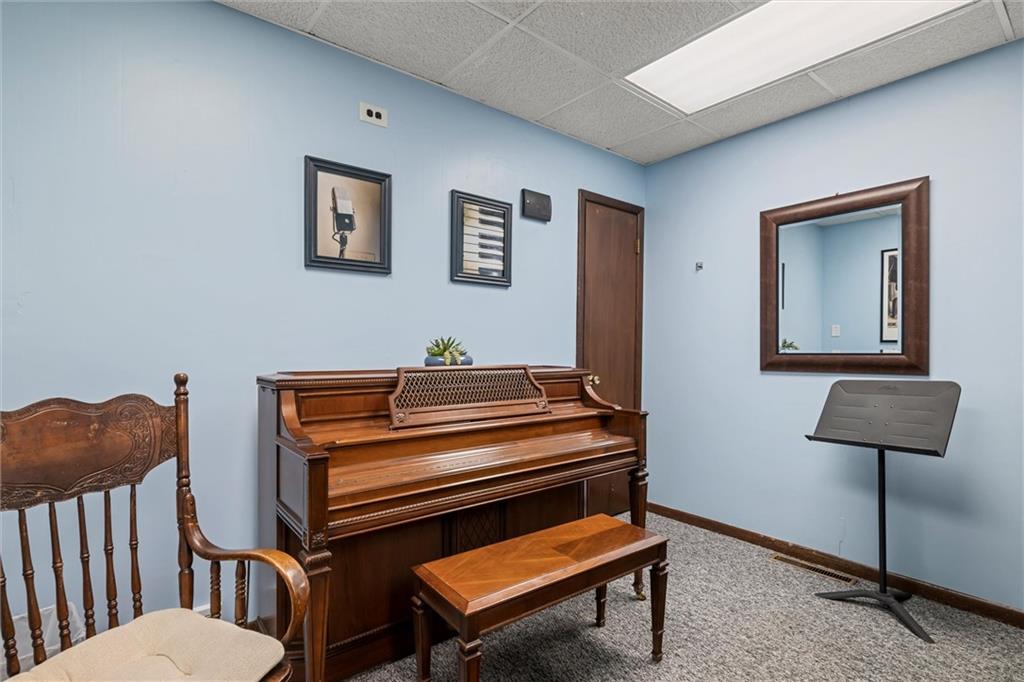129 North Washington Street Butler, PA 16001 - Photo 15 of 42 a bedroom with furniture and a window