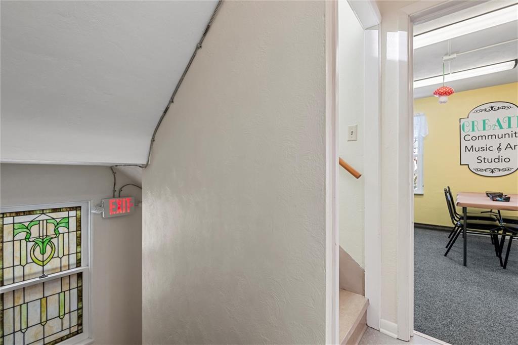 129 North Washington Street Butler, PA 16001 - Photo 19 of 42 a view of a hallway with workspace
