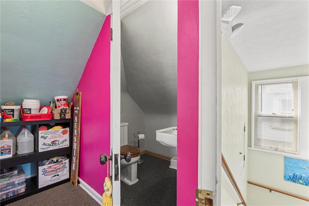 129 North Washington Street Butler, PA 16001 - Photo 25 of 42 a view of a bedroom with a bed and a window