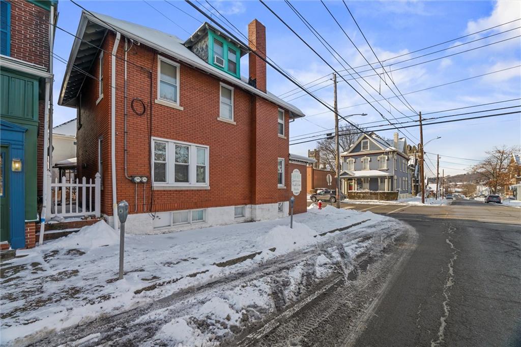 129 North Washington Street Butler, PA 16001 - Photo 36 of 42 a front view of a house with a road