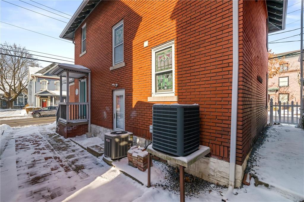 129 North Washington Street Butler, PA 16001 - Photo 38 of 42 a front view of a house with many windows