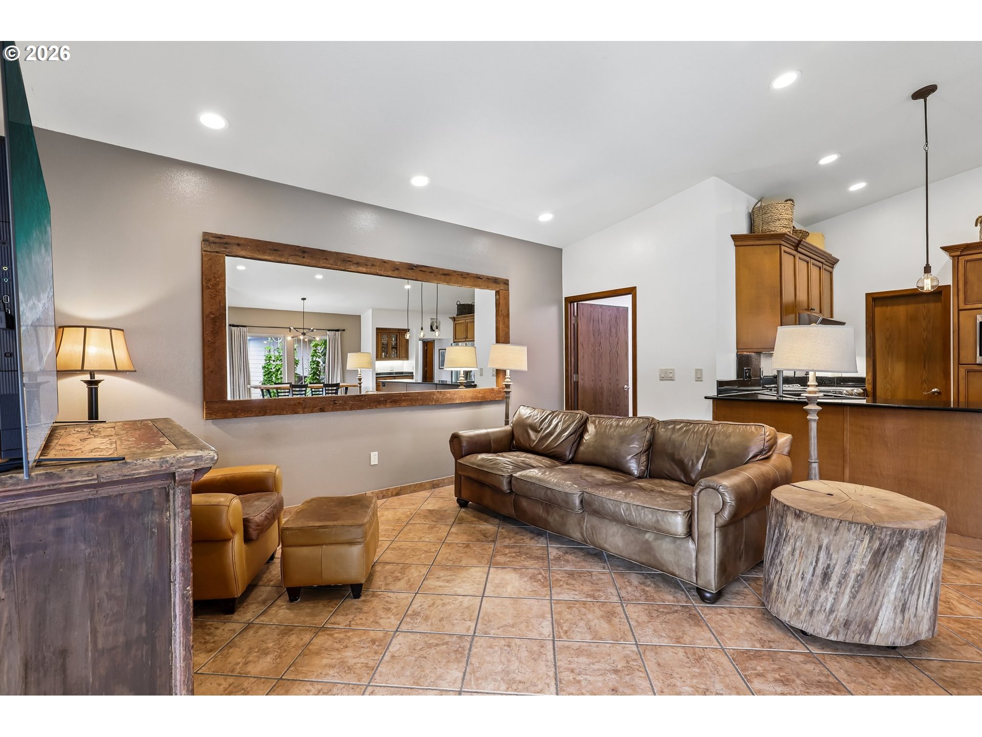 873 Mountain View Road Kalama, WA 98625 - Photo 10 of 45 a living room with furniture and a flat screen tv