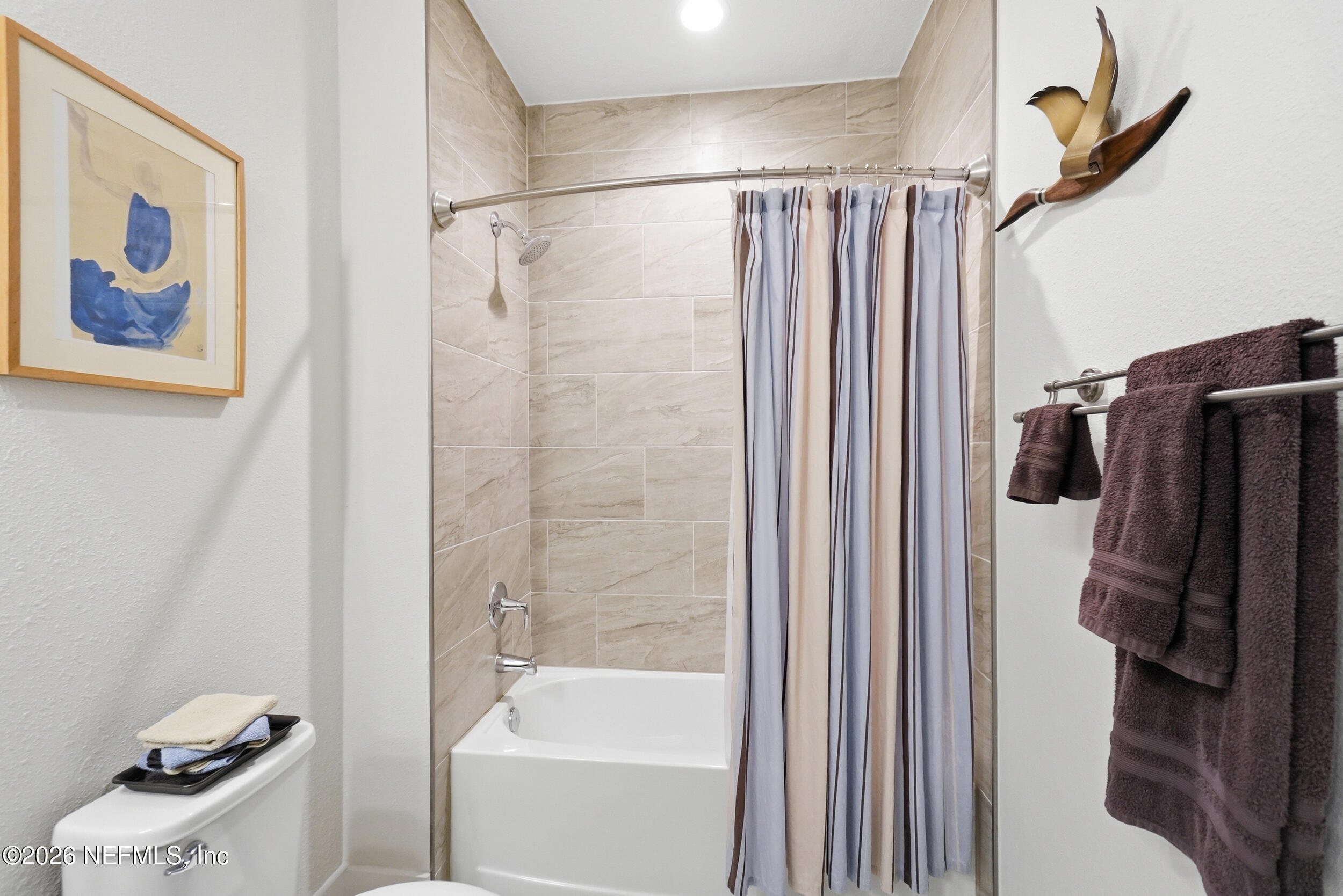 34 Red Rock Lane St. Johns, FL 32259 - Photo 38 of 71 a bathroom with a shower and a tub