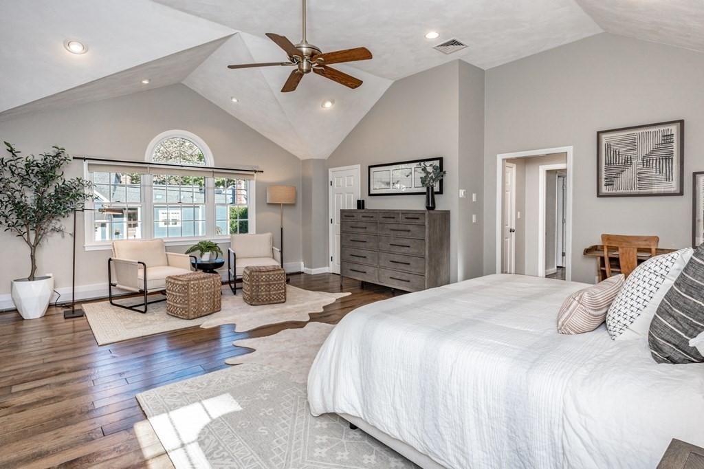 119 Gayland Road Needham, MA 02492 - Photo 22 of 42 a bedroom with a balcony a bed and a chandelier