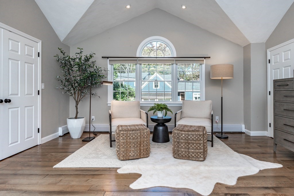 119 Gayland Road Needham, MA 02492 - Photo 23 of 42 a living room with furniture a table and a large window