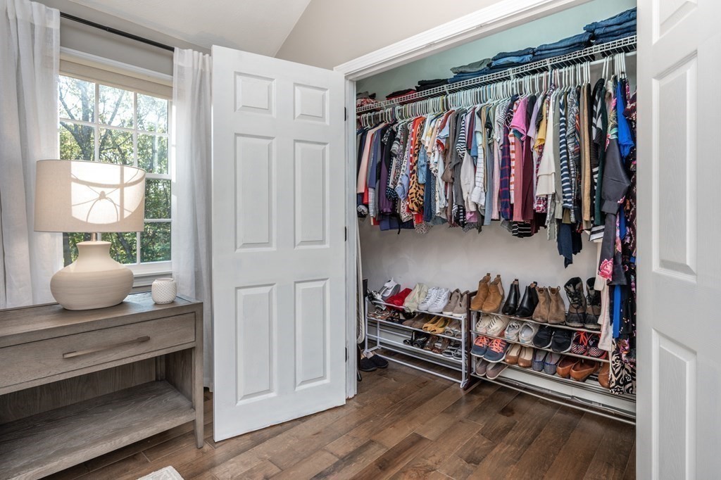 119 Gayland Road Needham, MA 02492 - Photo 25 of 42 a view of walk in closet with clothes and shoes