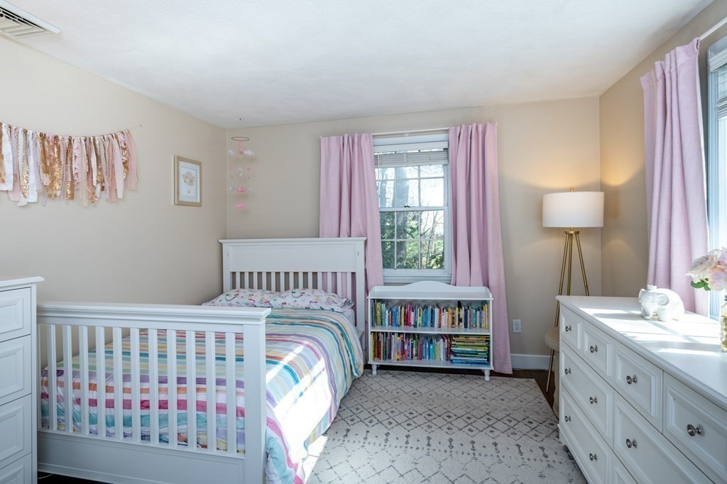 119 Gayland Road Needham, MA 02492 - Photo 27 of 42 a bedroom with a bed and a window