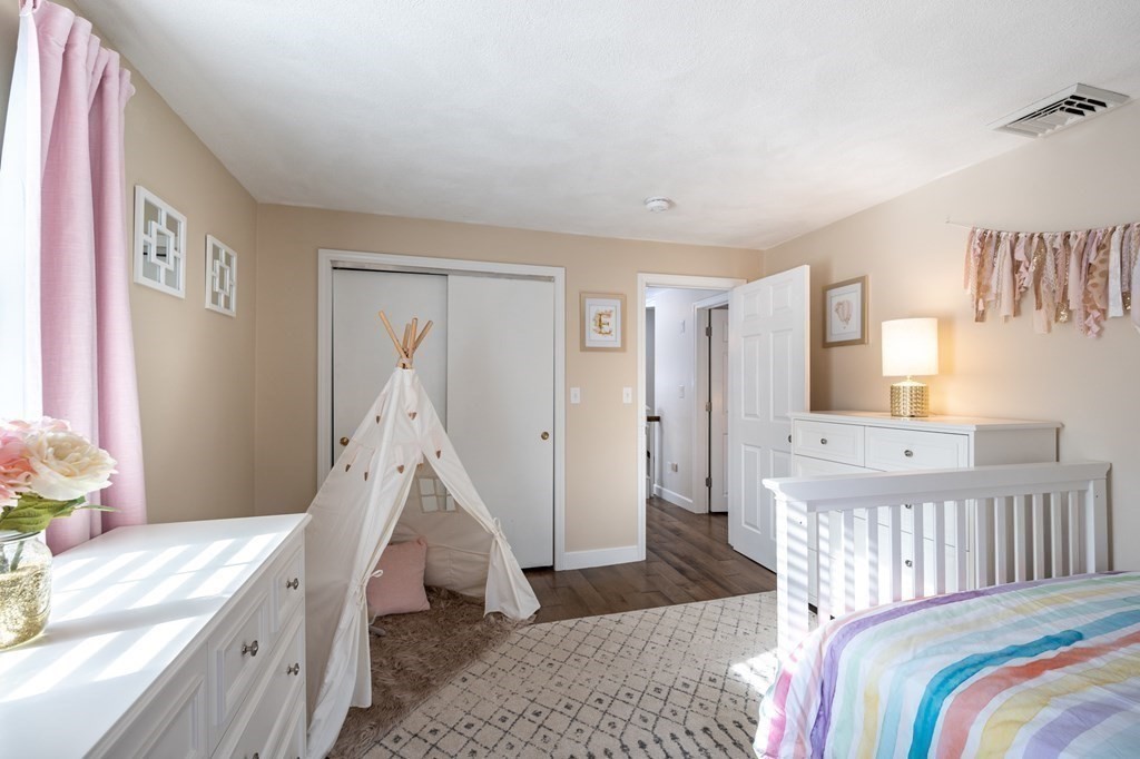 119 Gayland Road Needham, MA 02492 - Photo 28 of 42 a bedroom with a bed and a window