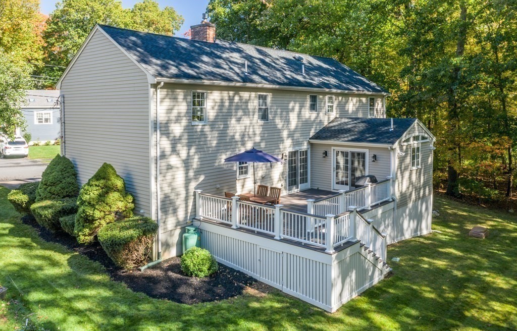 119 Gayland Road Needham, MA 02492 - Photo 35 of 42 a view of a house with backyard and sitting area
