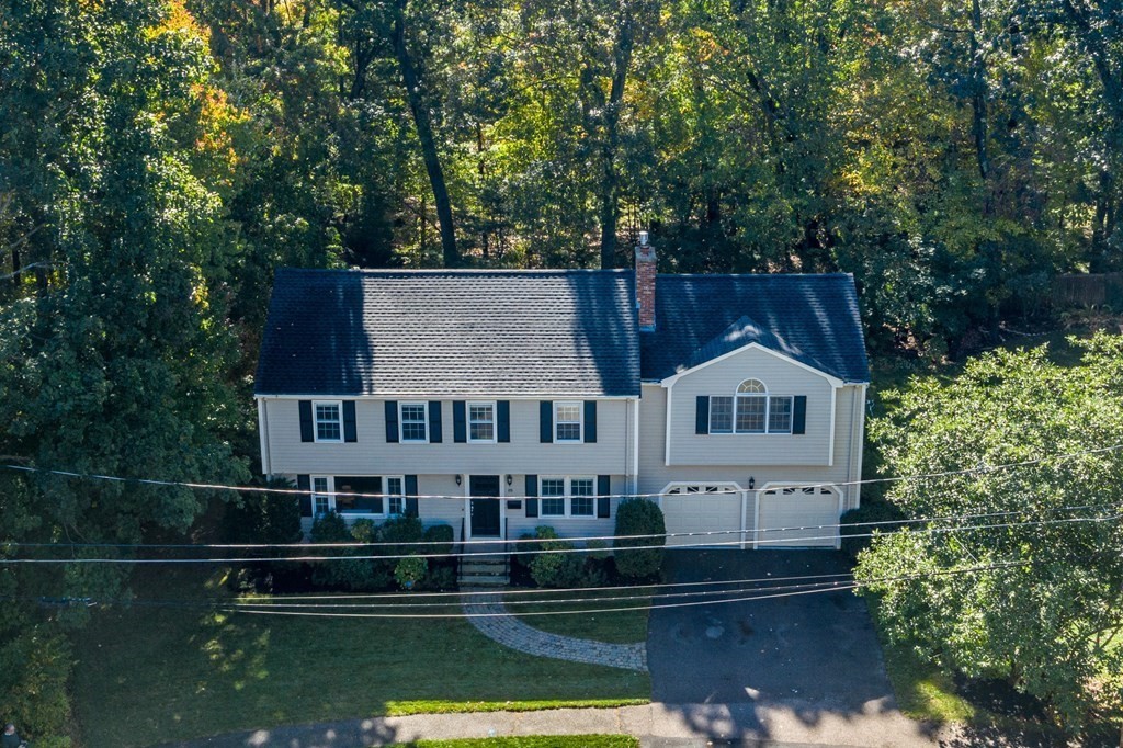 119 Gayland Road Needham, MA 02492 - Photo 40 of 42 front view of a house with a small yard