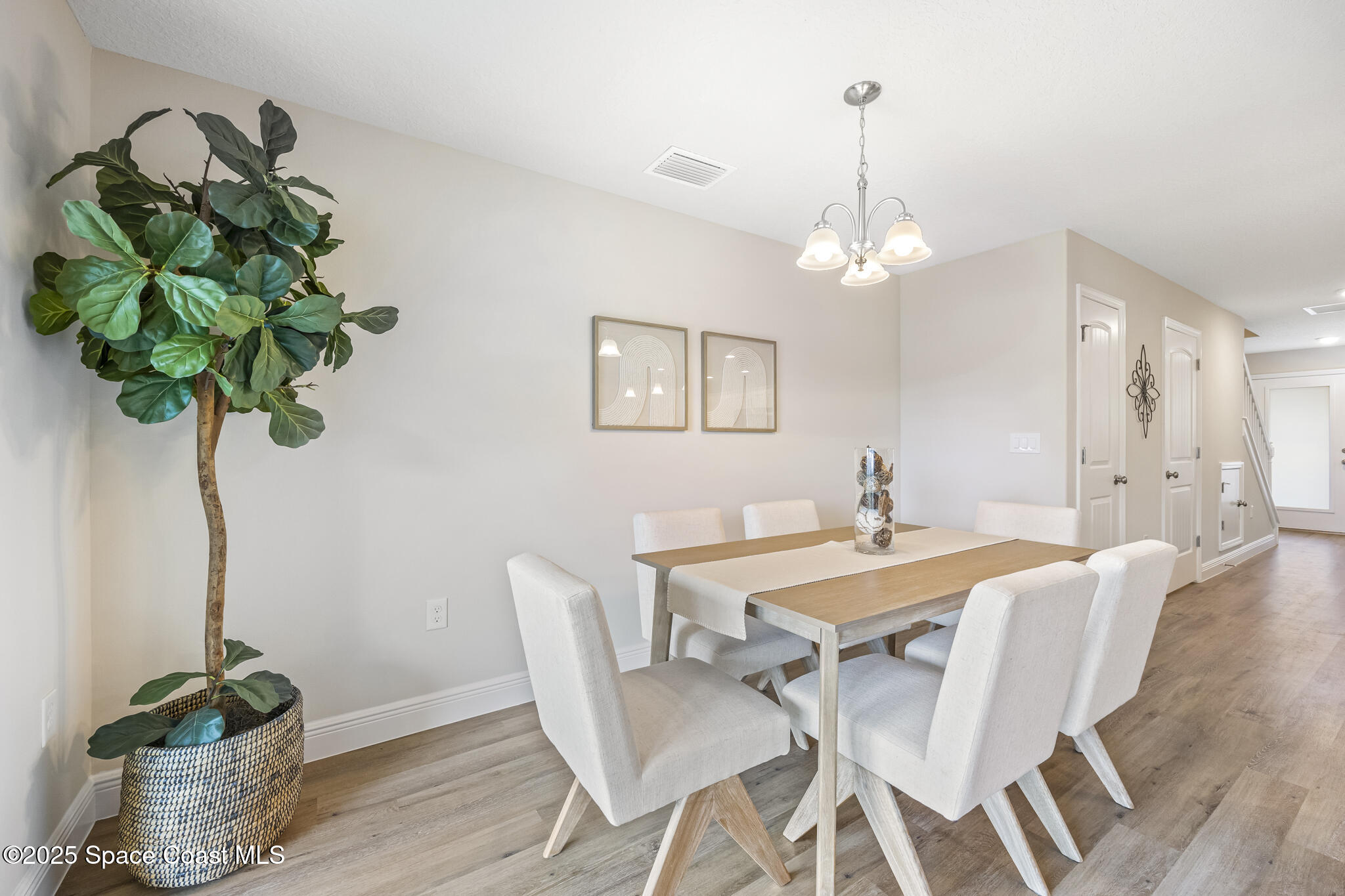 207-237 Hidden Wds Place Melbourne, FL 32901 - Photo 28 of 49 Middle Unit Dining area - Staged