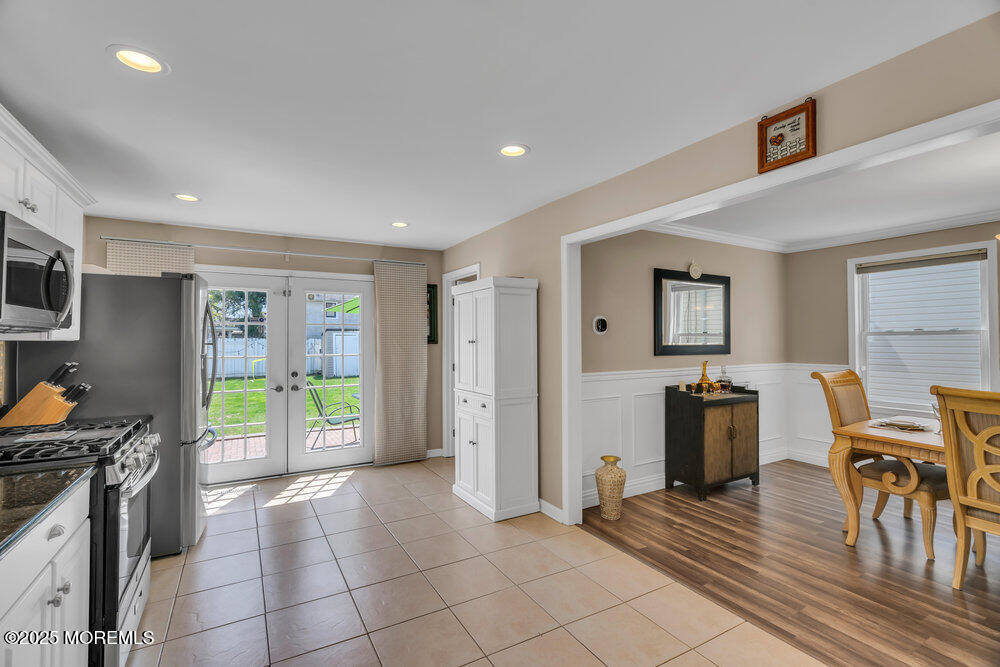 108 Maple Place Keyport, NJ 07735 - Photo 13 of 26 a view of a livingroom with furniture window and wooden floor