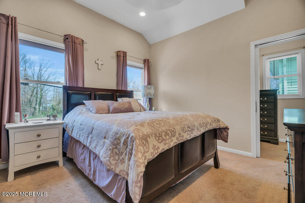 108 Maple Place Keyport, NJ 07735 - Photo 15 of 26 a bedroom with a large bed and a window