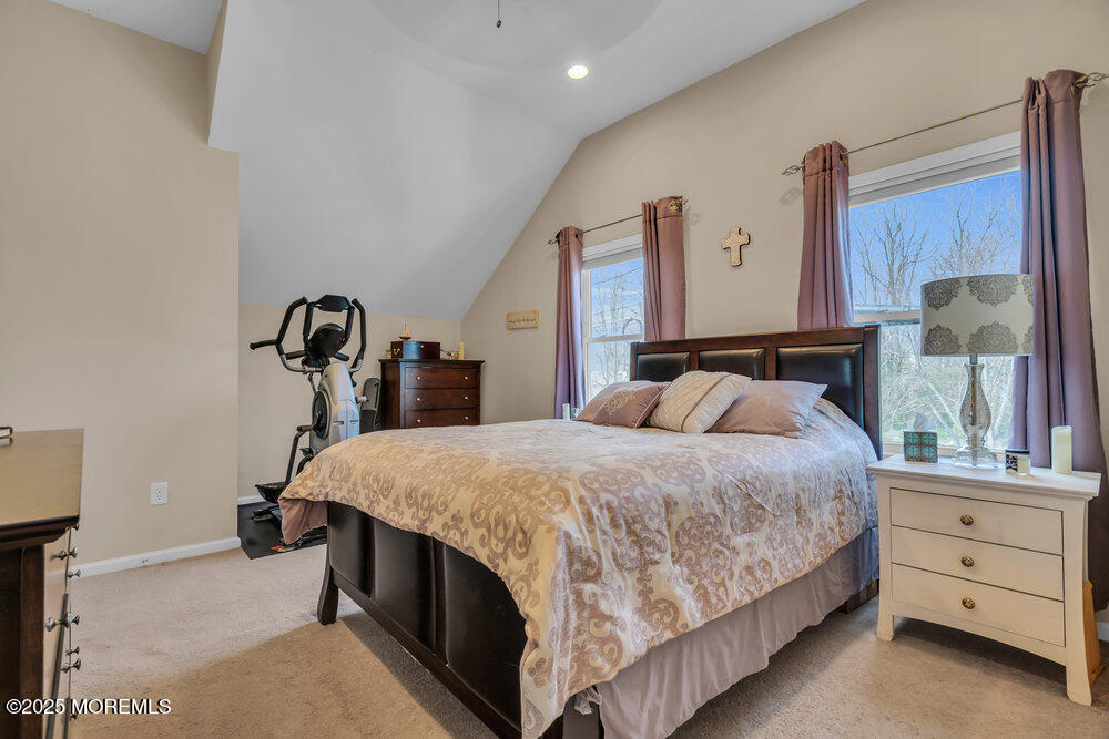 108 Maple Place Keyport, NJ 07735 - Photo 16 of 26 a bedroom with a bed and a dresser