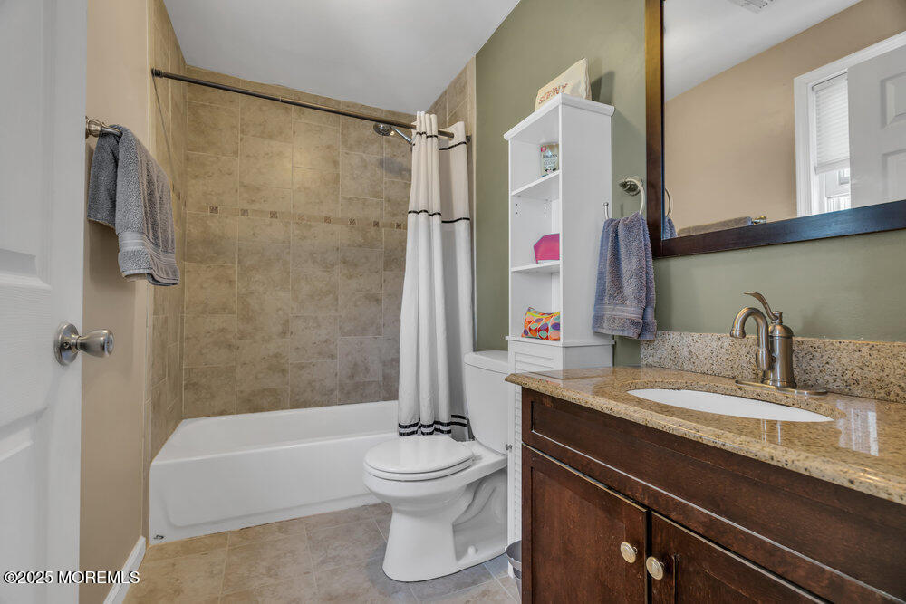 108 Maple Place Keyport, NJ 07735 - Photo 18 of 26 a bathroom with a sink a toilet and a bathtub