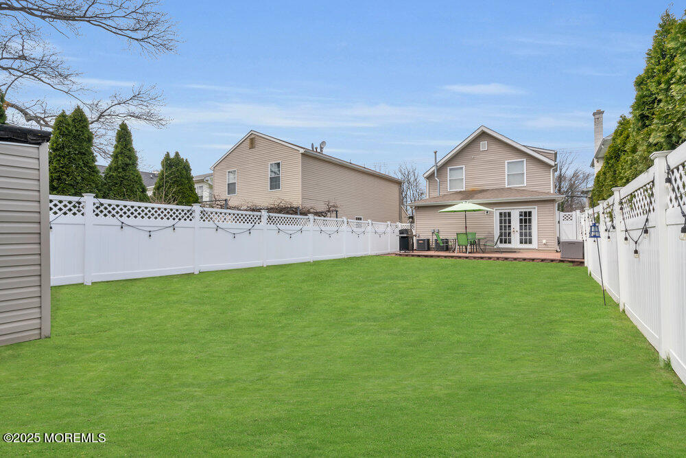 108 Maple Place Keyport, NJ 07735 - Photo 24 of 26 a front view of house with yard and green space