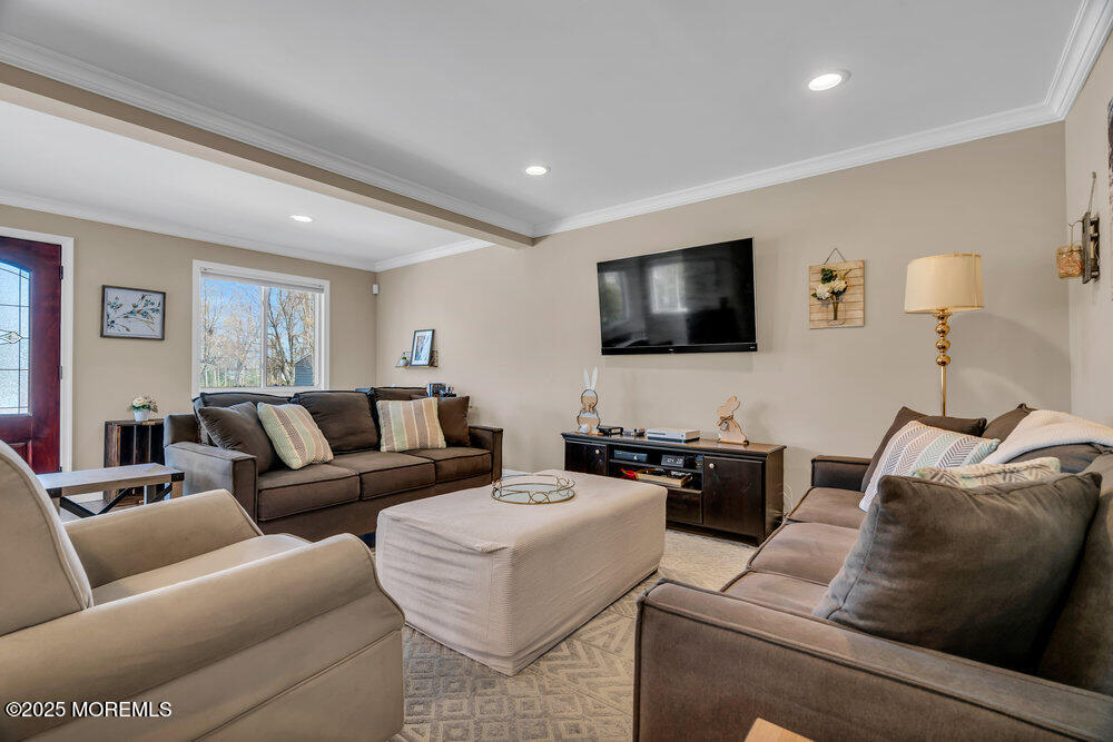 108 Maple Place Keyport, NJ 07735 - Photo 7 of 26 a living room with furniture and a flat screen tv