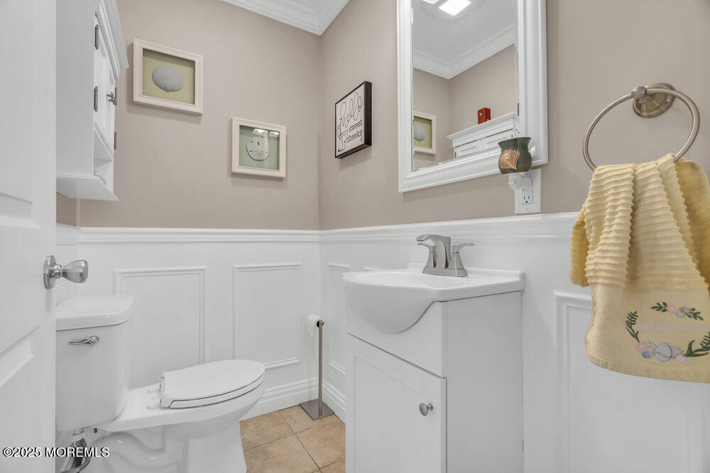 108 Maple Place Keyport, NJ 07735 - Photo 8 of 26 a bathroom with a sink toilet and vanity