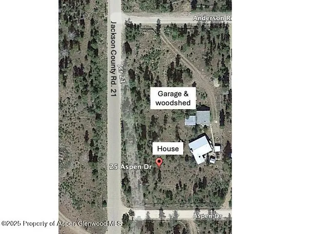 a kitchen with stainless steel appliances kitchen island granite countertop a refrigerator and microwave