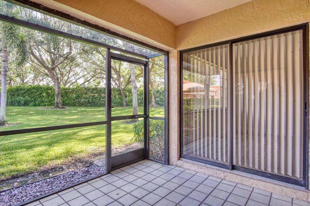 17388 Boca Club Boulevard, Unit 201 Boca Raton, FL 33487 - Photo 36 of 44 Patio to Backyard R.jpeg-SMALL
