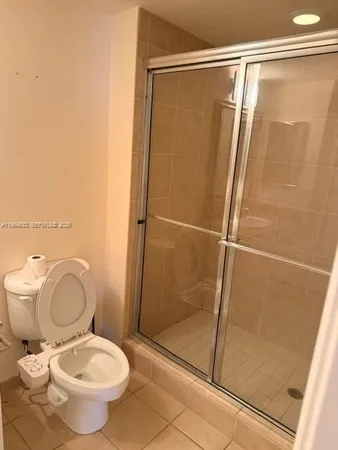 a view of cabinets with wooden floor