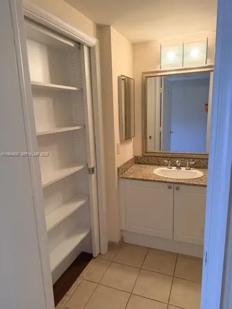 a view of a balcony with wooden fence