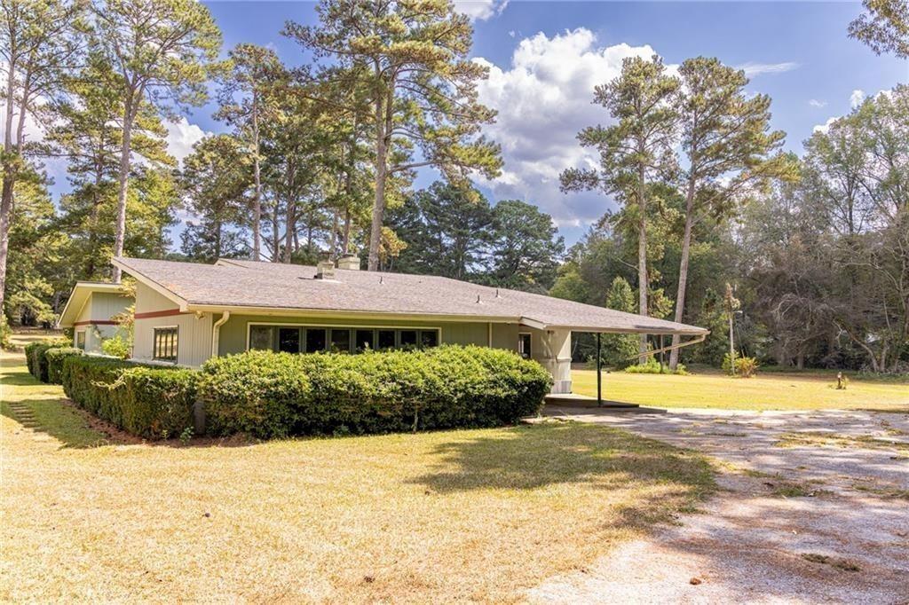 225 Banks Road Fayetteville, GA 30214 - Photo 20 of 26 a view of a house with a yard