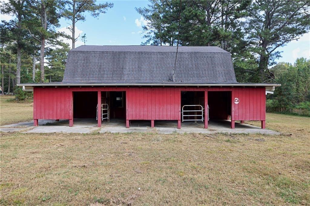 225 Banks Road Fayetteville, GA 30214 - Photo 22 of 26 a house with red door
