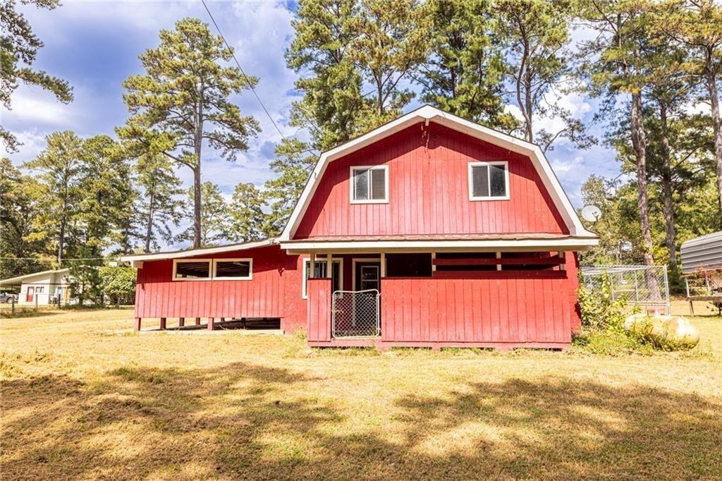 225 Banks Road Fayetteville, GA 30214 - Photo 24 of 26 a front view of a house with a yard