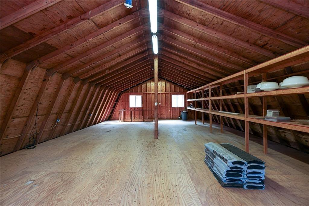 225 Banks Road Fayetteville, GA 30214 - Photo 6 of 26 a view of an empty room with wooden floor