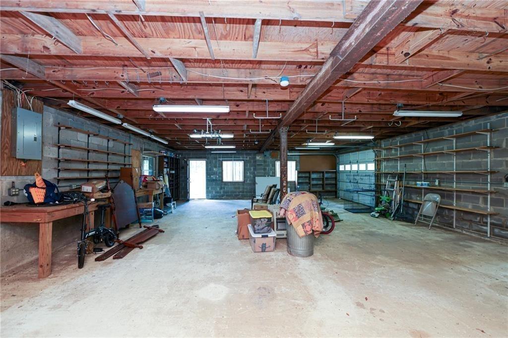 225 Banks Road Fayetteville, GA 30214 - Photo 7 of 26 a view of a room with wooden ceiling