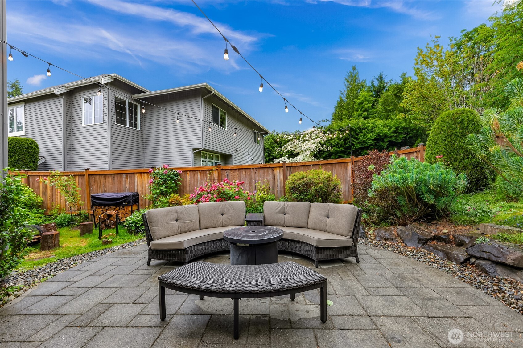 2029 240th Place Southeast Bothell, WA 98021 - Photo 33 of 39 a outdoor space with patio couches and a potted plant