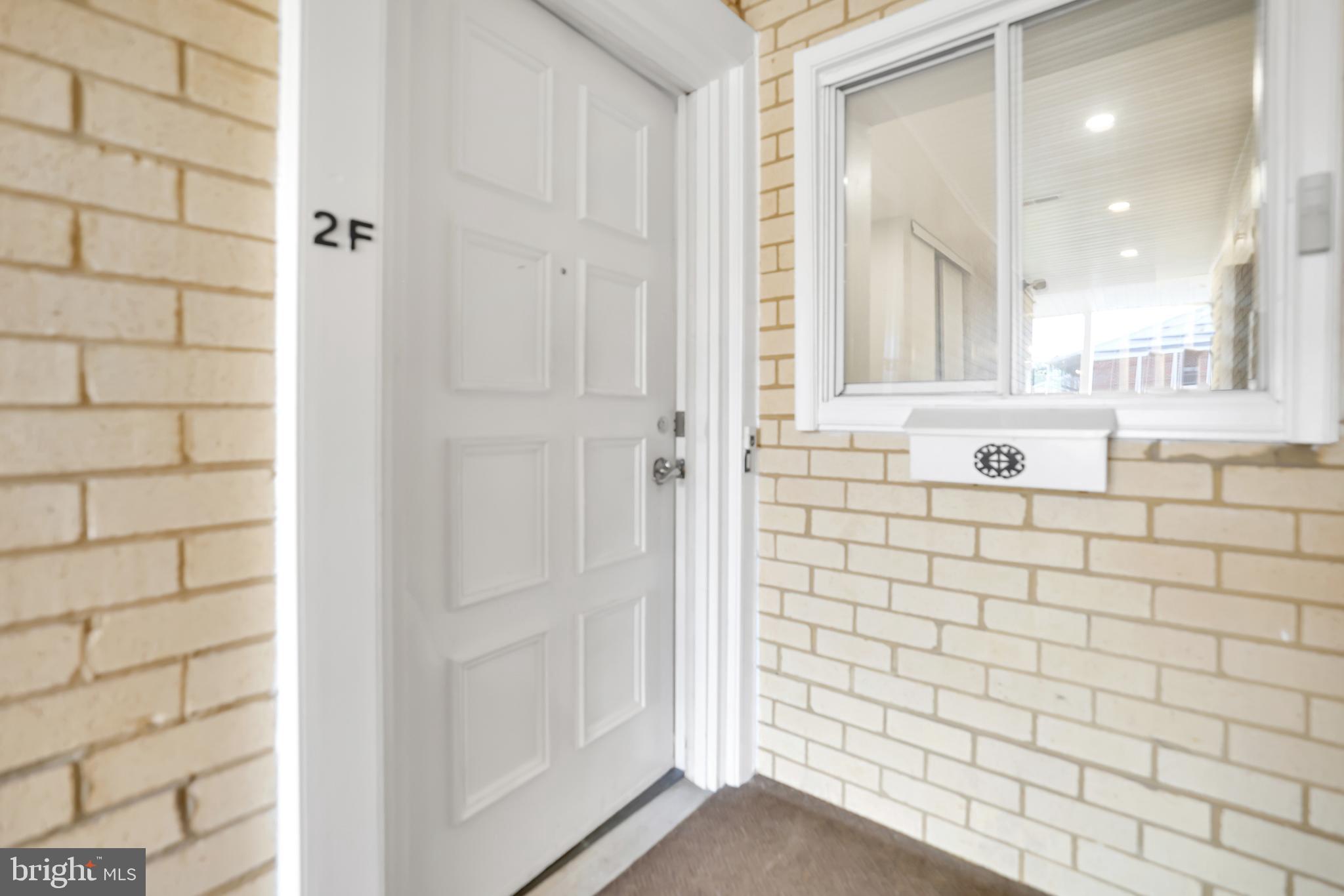 15121 Glade Drive, Unit 132F Silver Spring, MD 20906 - Photo 18 of 27 a bathroom with a shower and a sink